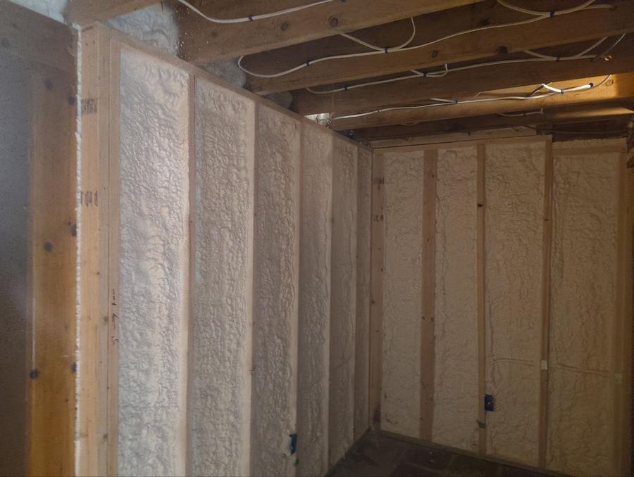 Foamed basement walls meeting at a corner, Meriden, CT