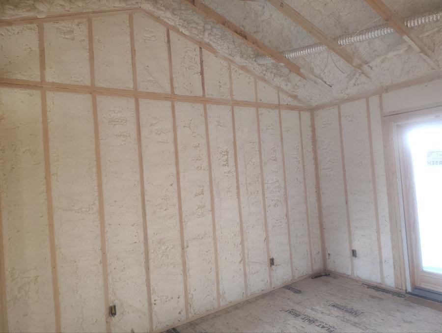 Spray foam filling the walls and gable end of a vaulted room, Copake Lake, NY