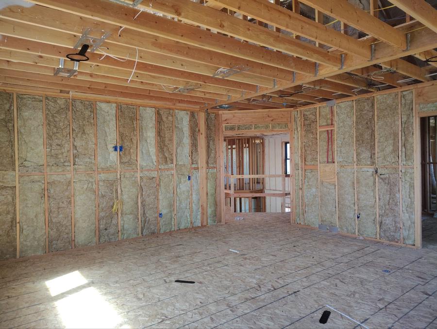 Insulation batts fitted into every wall bay of a framed room, Newburgh, NY