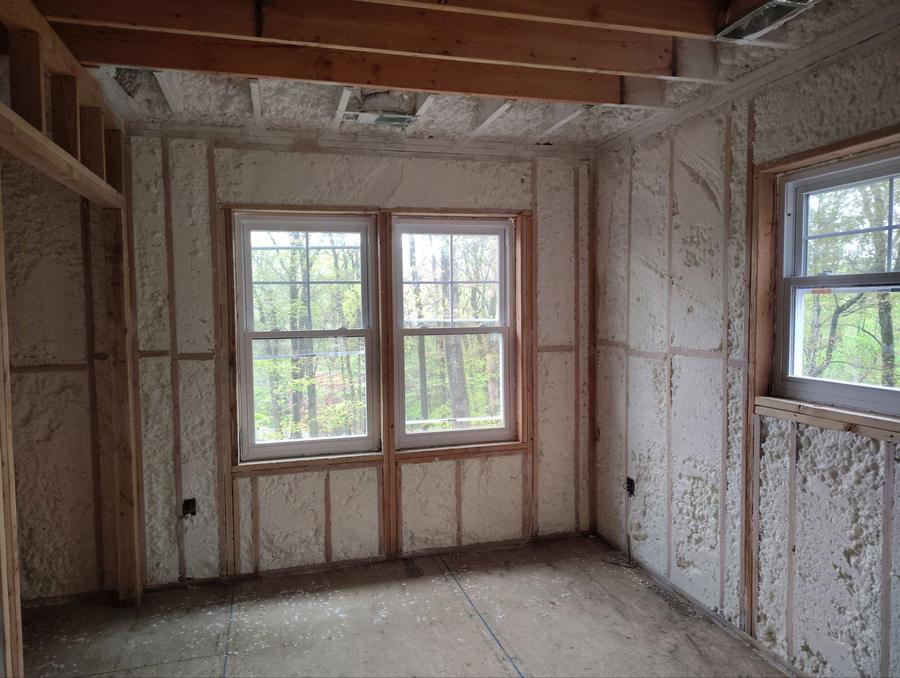 Spray foam filling the wall bays around a pair of windows, South Salem, NY