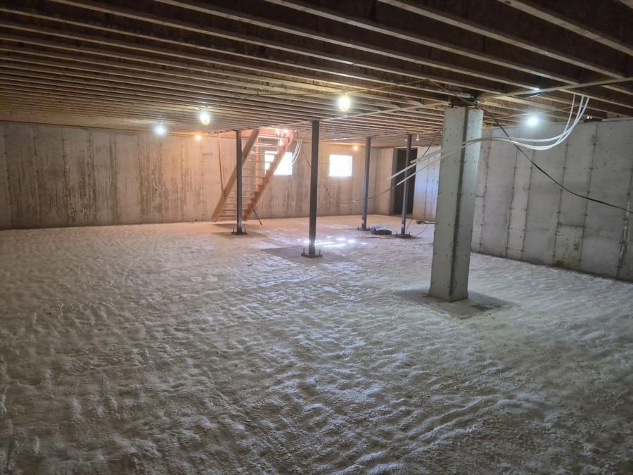 Same basement with spray foam covering the gravel base, Norwalk, CT