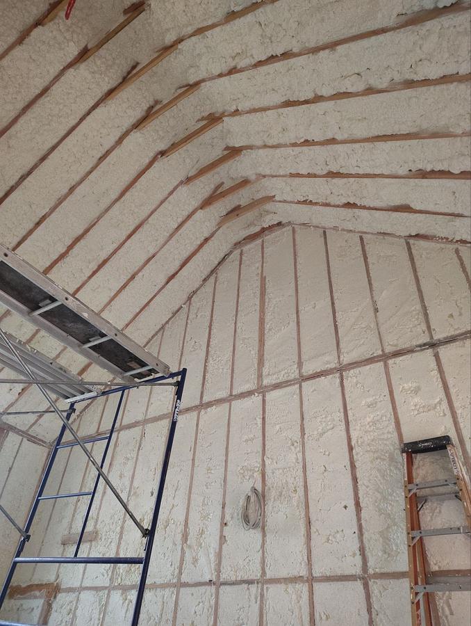 Spray foam covering a vaulted ceiling and gable wall, Tenafly, NJ
