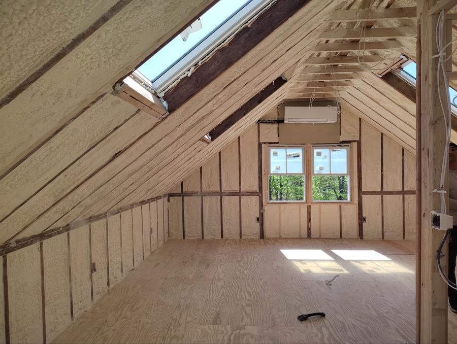 Spray foam on the roof slopes and walls of an attic room, East Haddam, CT