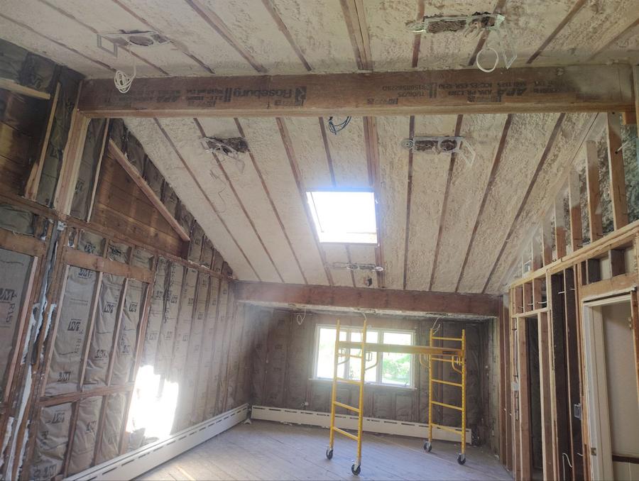 Spray foam on a sloped ceiling above batt-insulated walls, Harwinton, CT