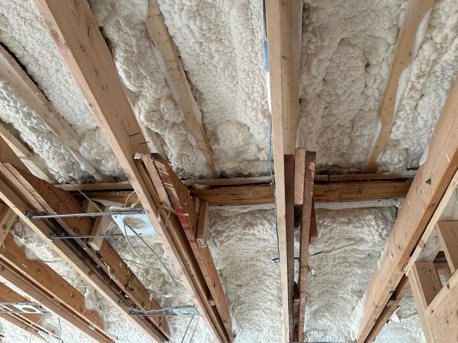 Spray foam between ceiling rafters and beams, Mahopac, NY