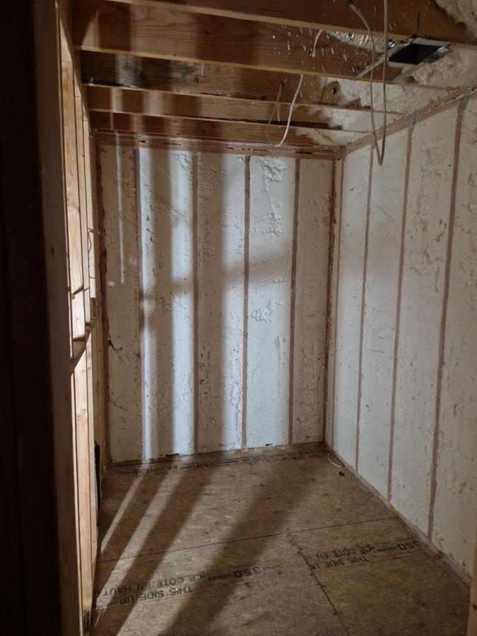 Small room with foam-insulated walls, West Islip, NY