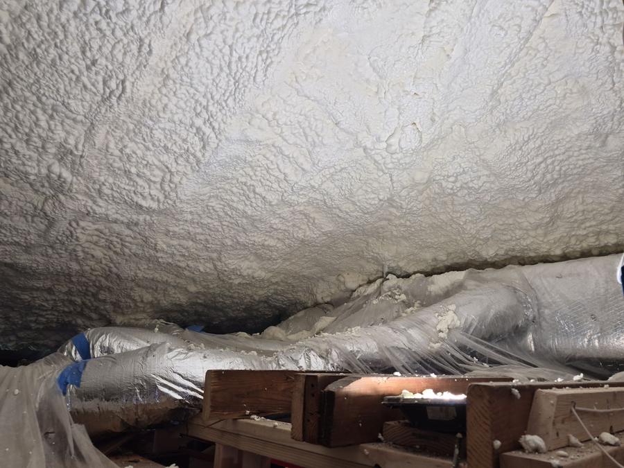 Spray foam covering the underside of the roof deck above the ductwork, Fort Lee, NJ
