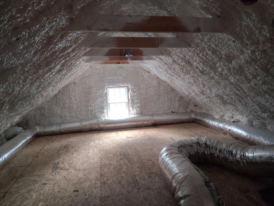 Open-cell spray foam covering the attic roof deck from end to end, Scarsdale, NY