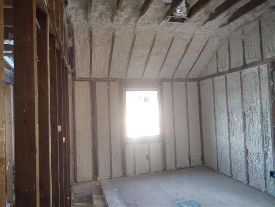 Foam-insulated vaulted ceiling and walls around a window, Cresskill, NJ