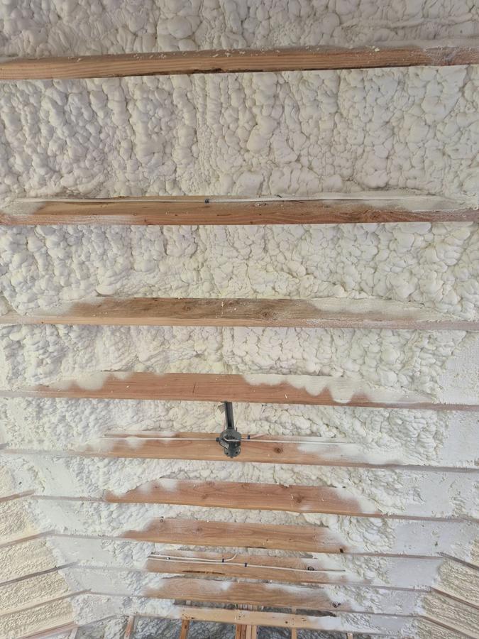 Close view of spray foam covering the roof deck between the rafters, North Branford, CT
