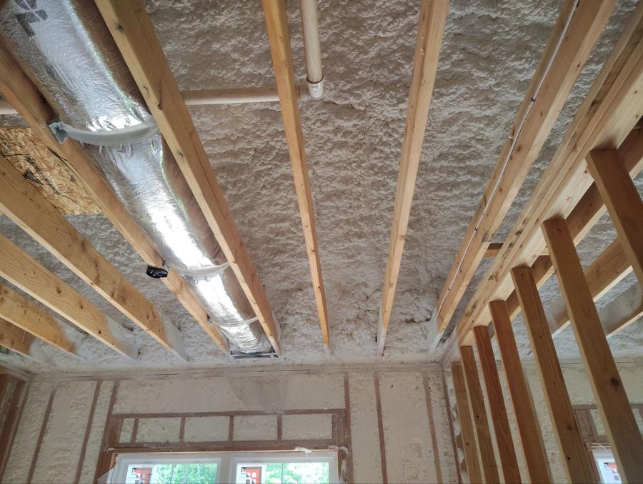 Spray foam covering the ceiling between the joists above the ductwork, Southbury, CT