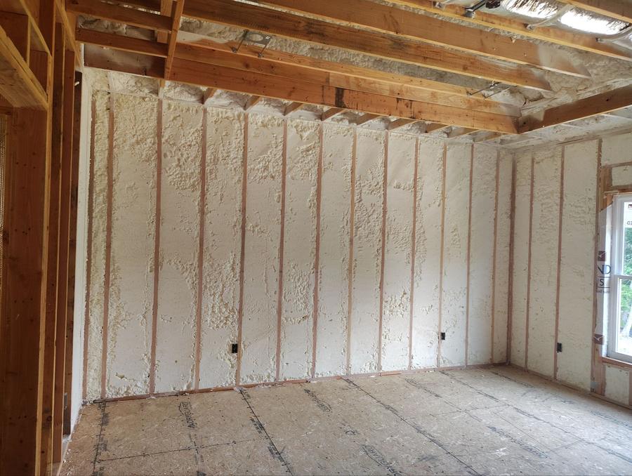 Spray foam filling the stud bays of an exterior wall, Southbury, CT