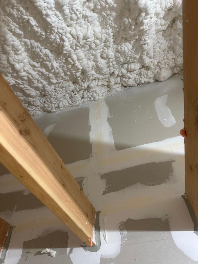 Foam-covered attic surface above the drywall ceiling, Port Chester, NY