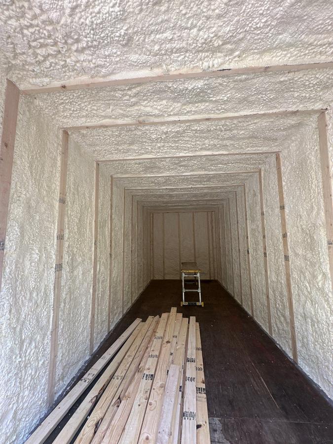 After: walls and ceiling fully covered in spray foam, New City, NY