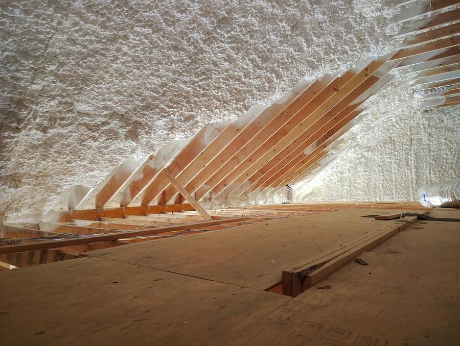 Open-cell foam covering the attic roof deck between rafters, Lagrangeville, NY