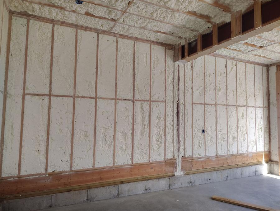 Spray foam filling the stud bays along a long wall, Lagrangeville, NY
