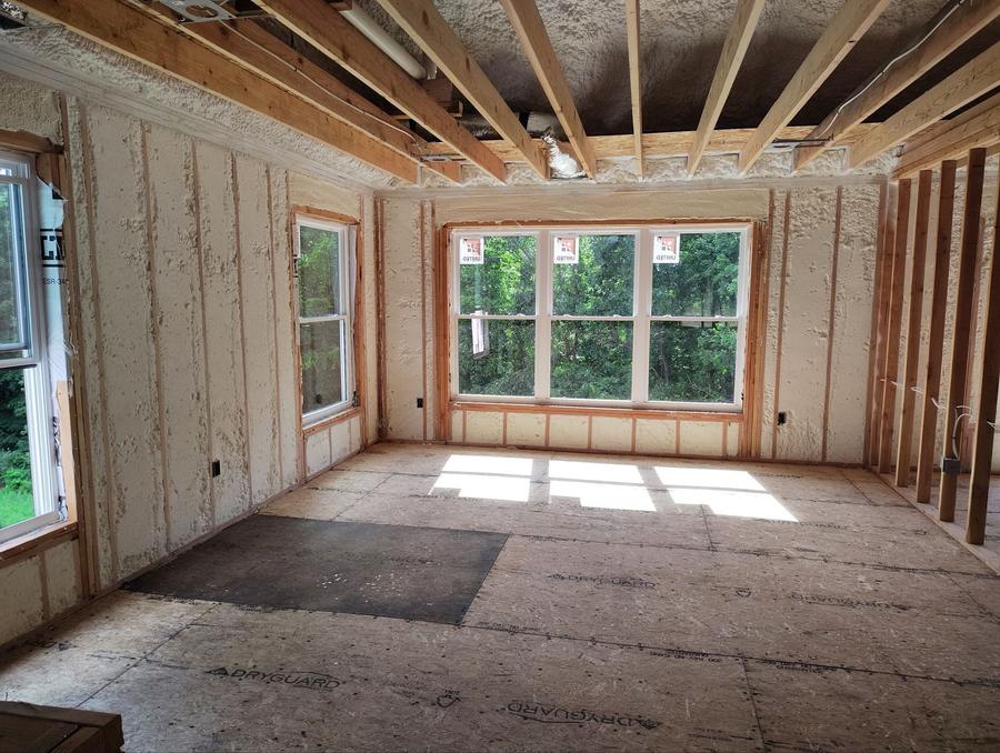Foamed walls around a bank of windows in a framed room, Southbury, CT