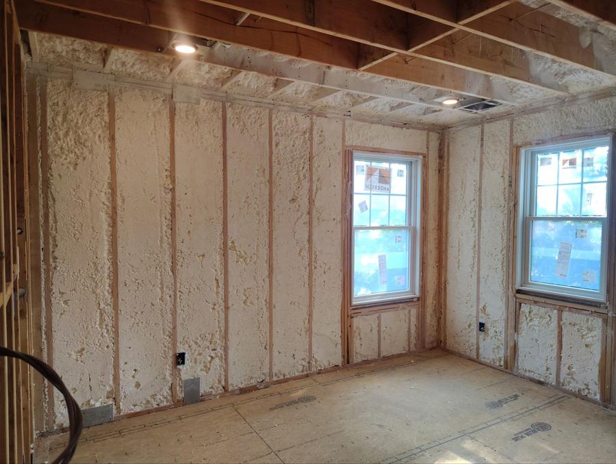 Foam filling the wall cavities around two windows, Yonkers, NY