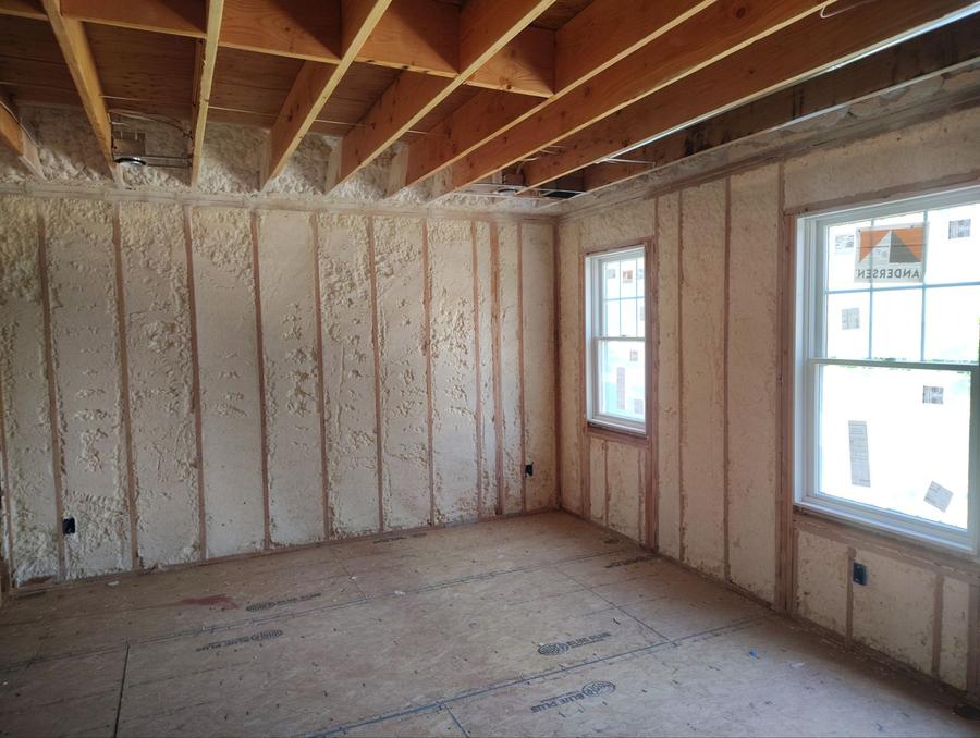 Spray foam across the exterior walls of a corner room, Yonkers, NY