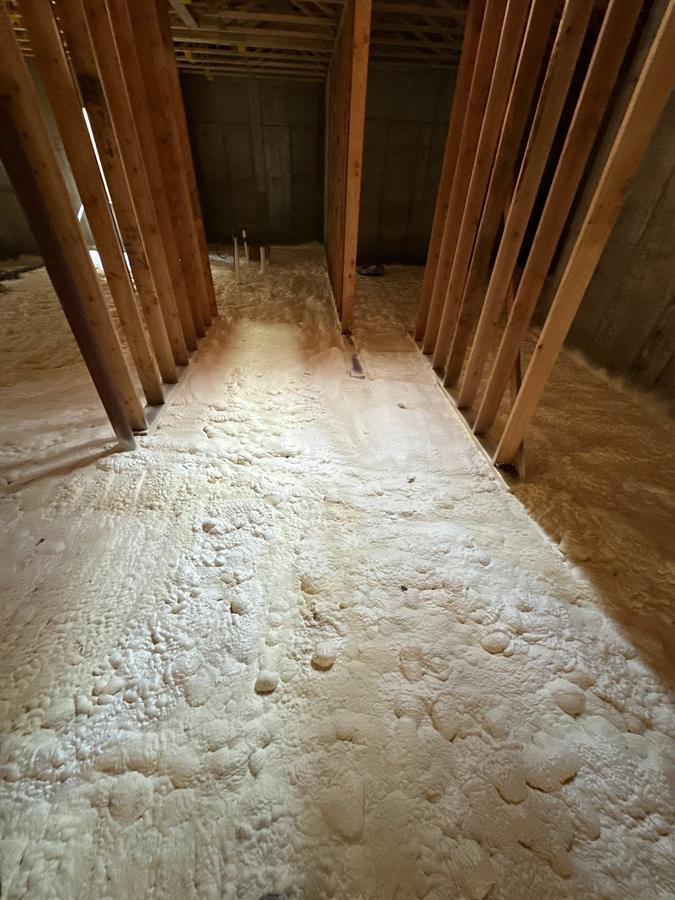 Foam-covered floor running between framed walls, Brewster, NY