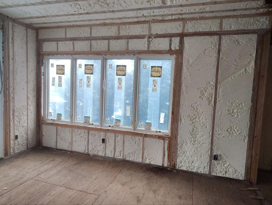 Foamed exterior wall around a bank of windows, Fairfield, CT