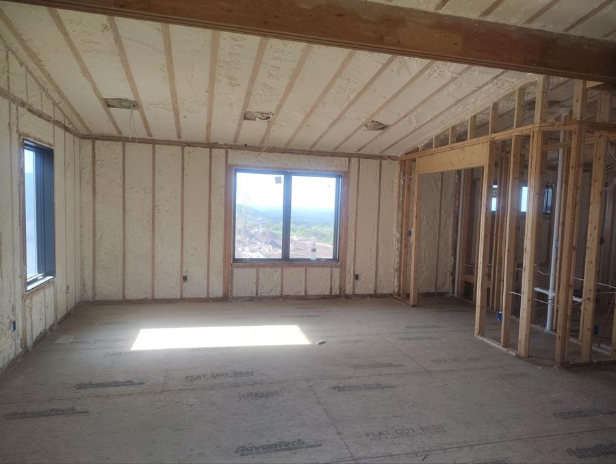 Foamed sloped ceiling and exterior walls in a large room, Fishkill, NY