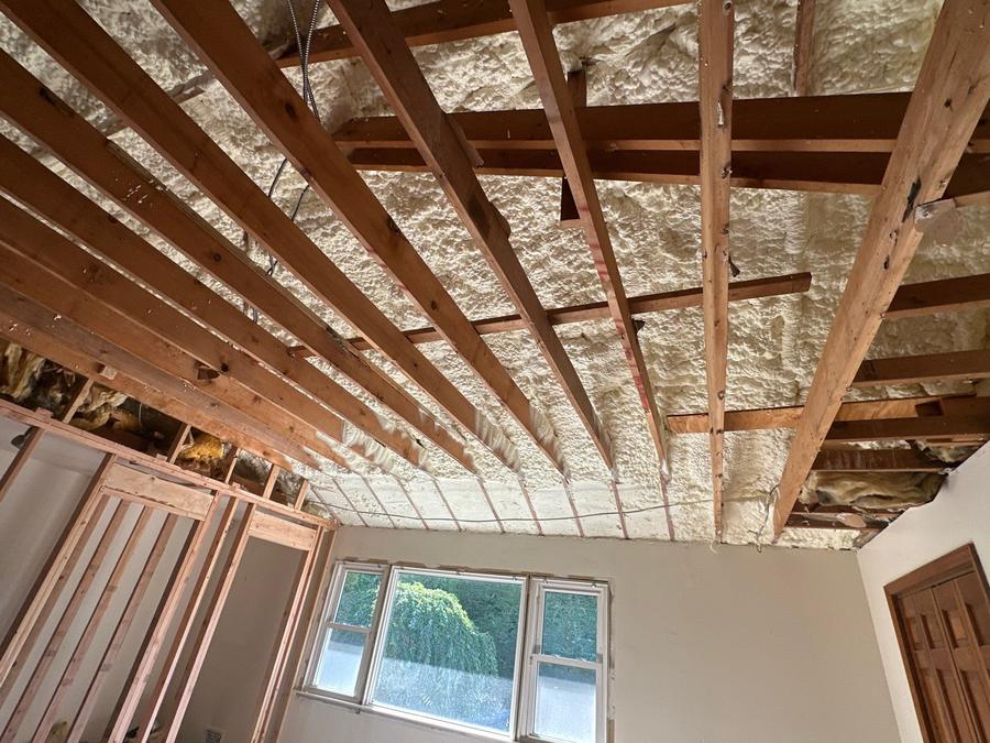 Spray foam applied to the underside of the roof deck above open rafters, Bronxville, NY