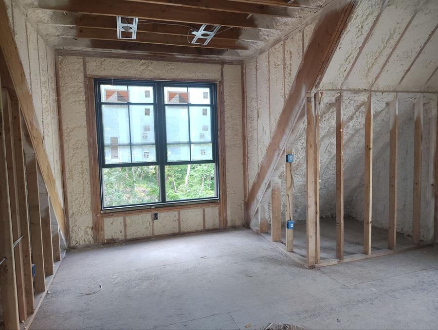 Foamed sloped ceilings and walls around a window, Yorktown Heights, NY