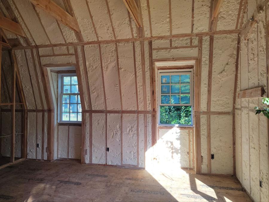 Foamed walls and sloped ceiling around two windows, Darien, CT