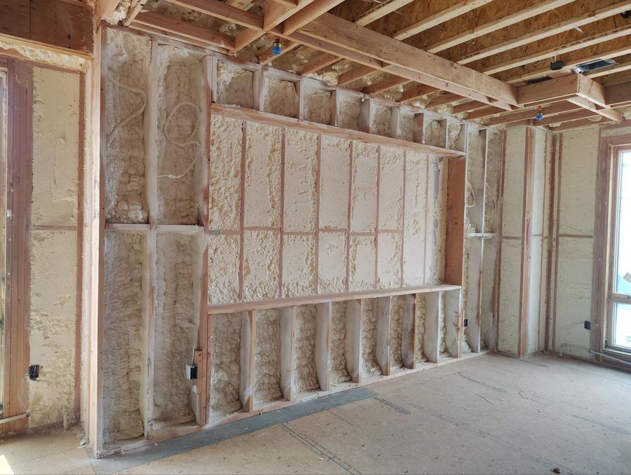 Spray foam filling the wall cavities around a framed niche, Fort Lee, NJ