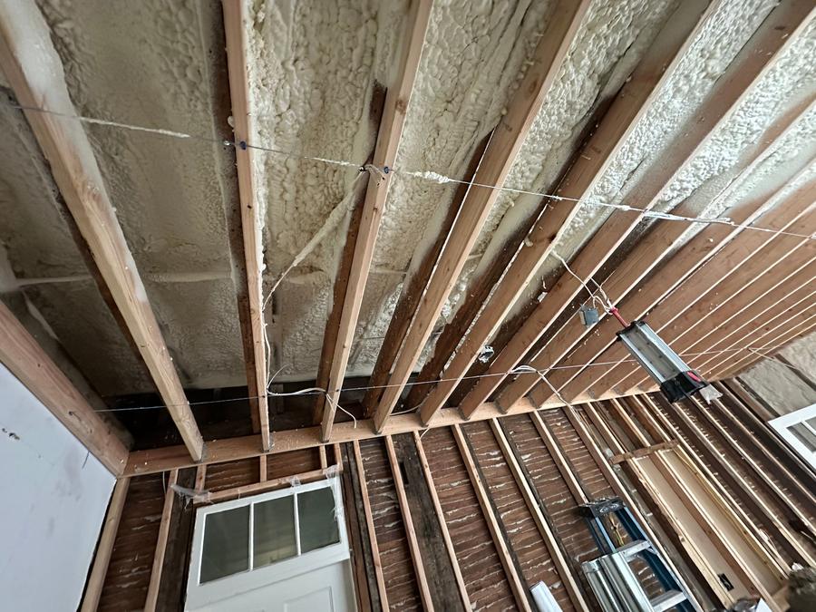 Foam-filled rafter bays running the length of the room, Pound Ridge, NY