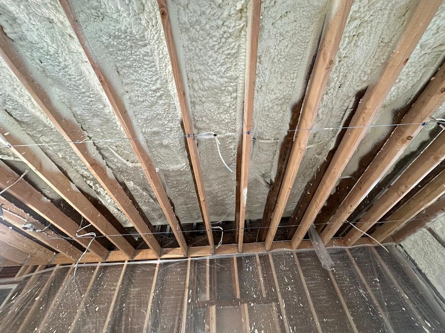 Spray foam sealed between the roof rafters of a vaulted ceiling, Pound Ridge, NY