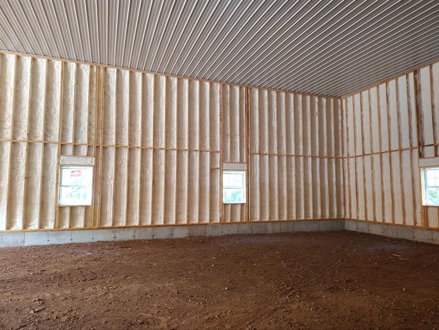 Spray foam covering the walls of a large post-frame building, East Hampton, CT