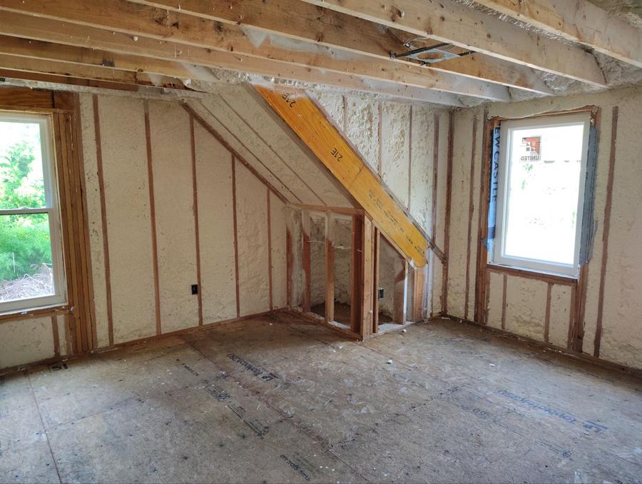 Foamed walls and sloped ceiling around two windows, Brookfield, CT