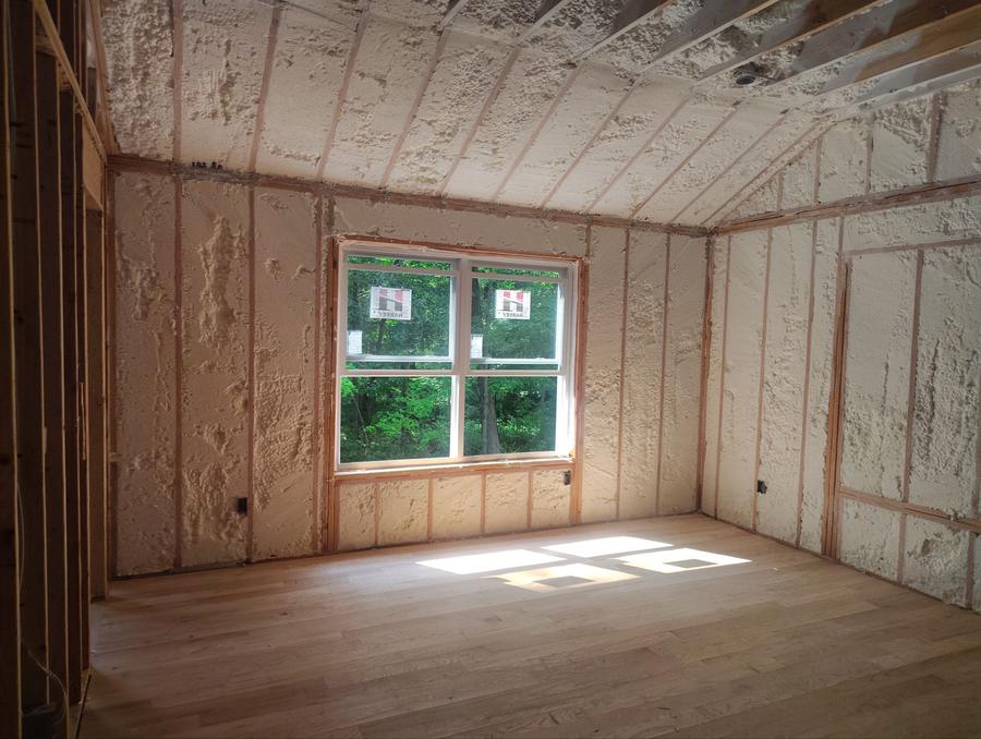 Foamed wall cavities and sloped ceiling in a framed room, Patterson, NY