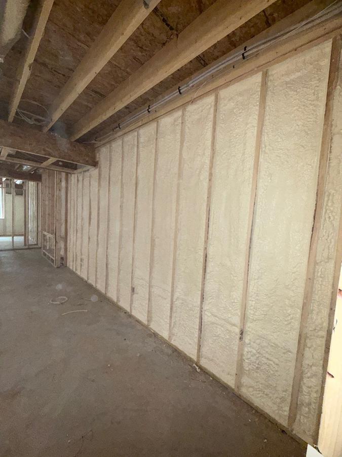 Spray foam run the full length of a framed basement wall, Bristol, CT