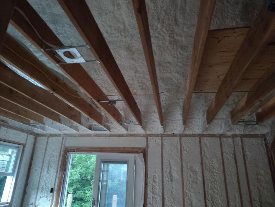 Foam sprayed between the ceiling joists above the walls, Newtown, CT
