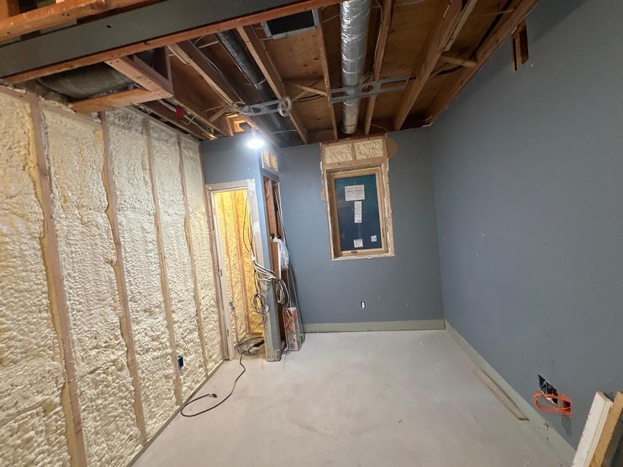 Foamed basement wall running the length of the room, White Plains, NY