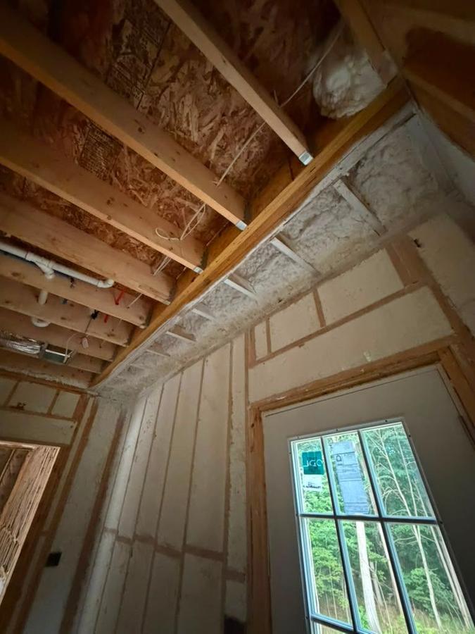 Foamed walls and sloped ceiling above a window, Wappingers Falls, NY