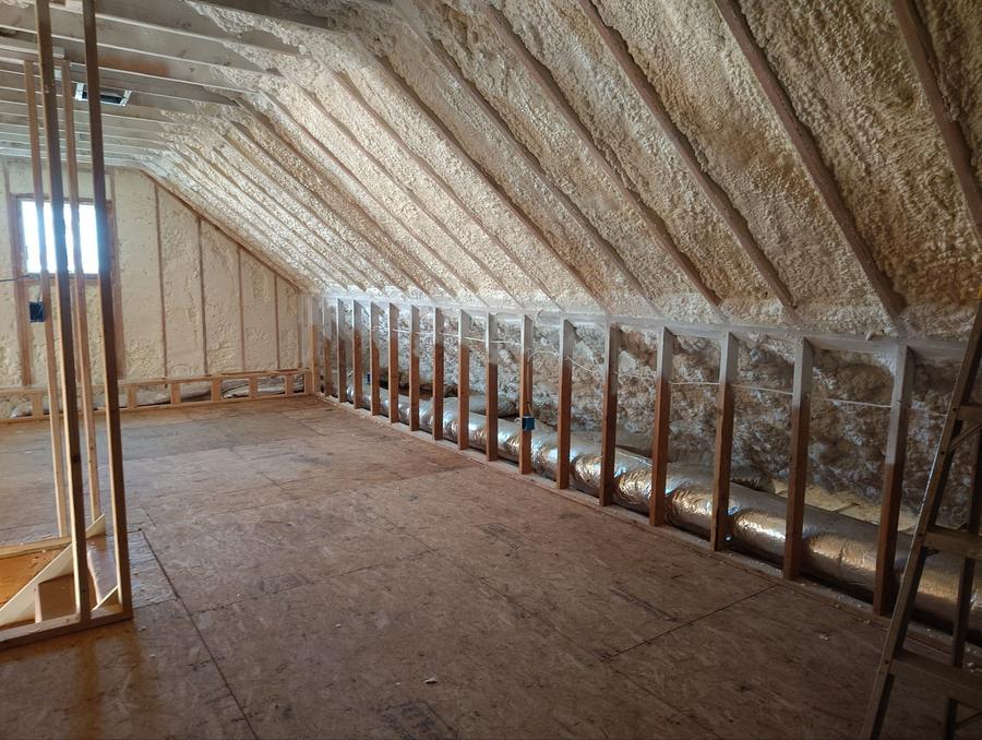 Long attic with spray foam covering the underside of the roof, Greenwich, CT