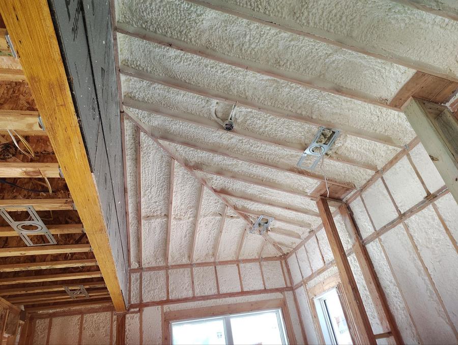 Spray foam covering a vaulted ceiling and angled walls, Closter, NJ