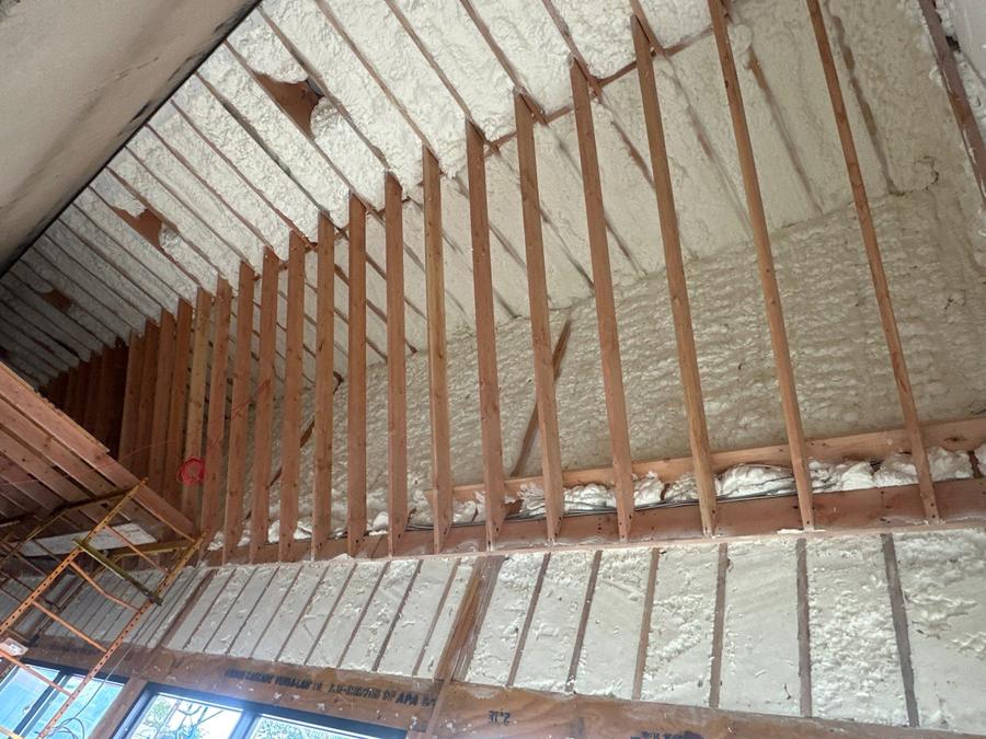 Spray foam filling the bays of a high vaulted roof, Clifton, NJ
