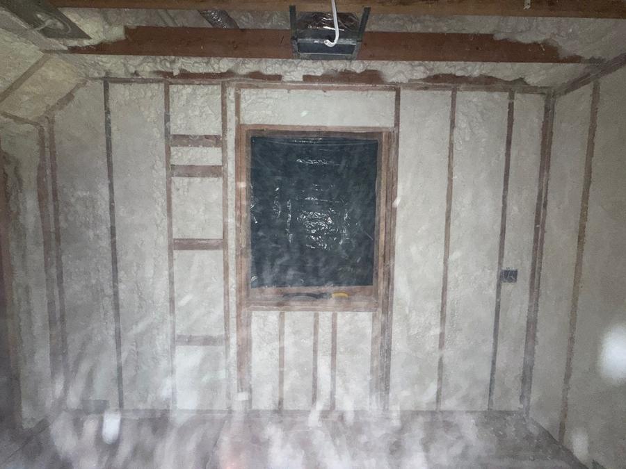Foamed stud bays around a framed window, Darien, CT