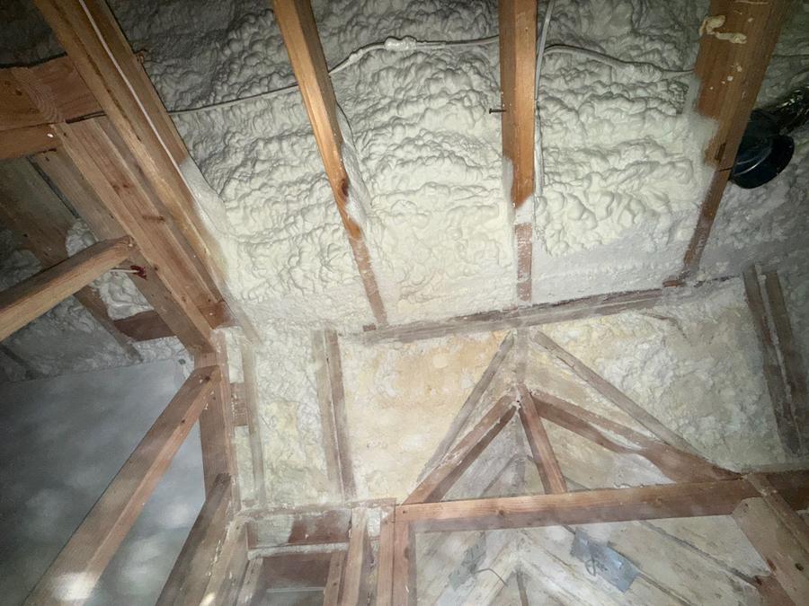 Spray foam between the rafters of a roof deck, Darien, CT