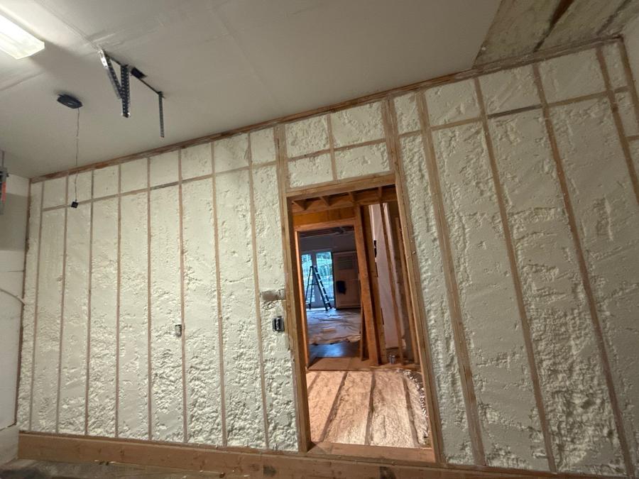 A foamed wall running past a window opening, Darien, CT