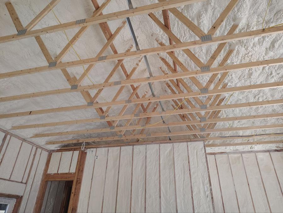 Spray foam covering the underside of the roof deck above the trusses, Harwinton, CT