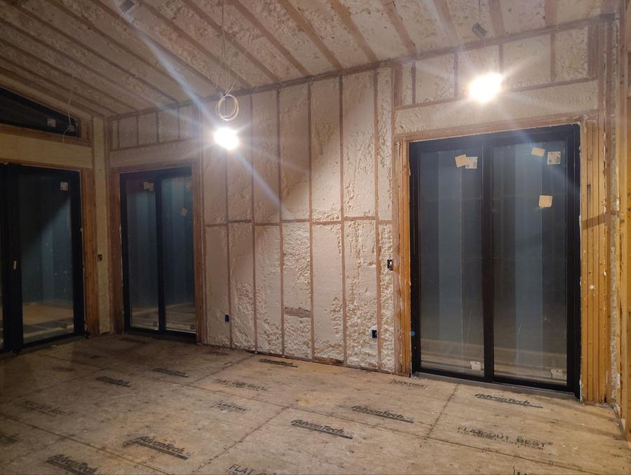 Open-cell foam sprayed between the wall studs and across the ceiling, Pine Plains, NY