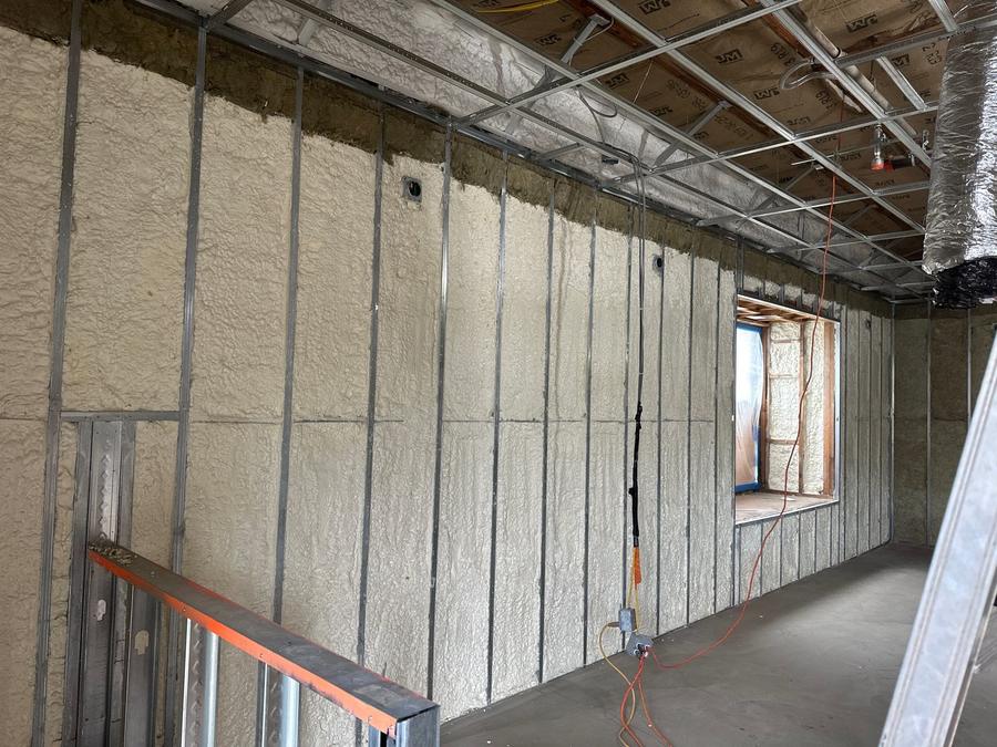 A long foamed wall running the length of the room, Ridgefield, CT